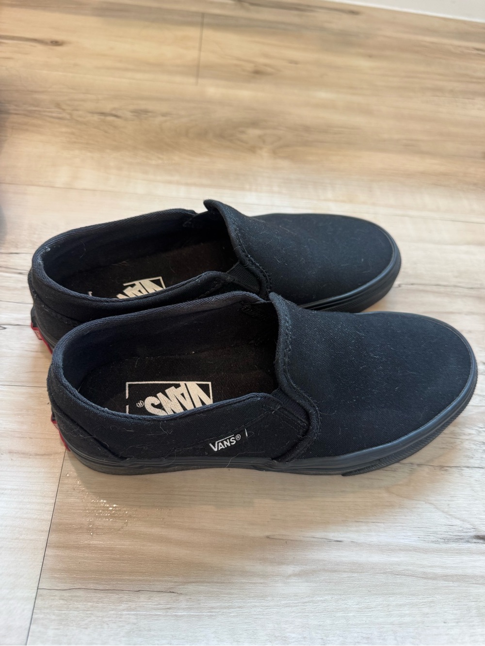 Vans Kids Slip-On Sneakers in Black
